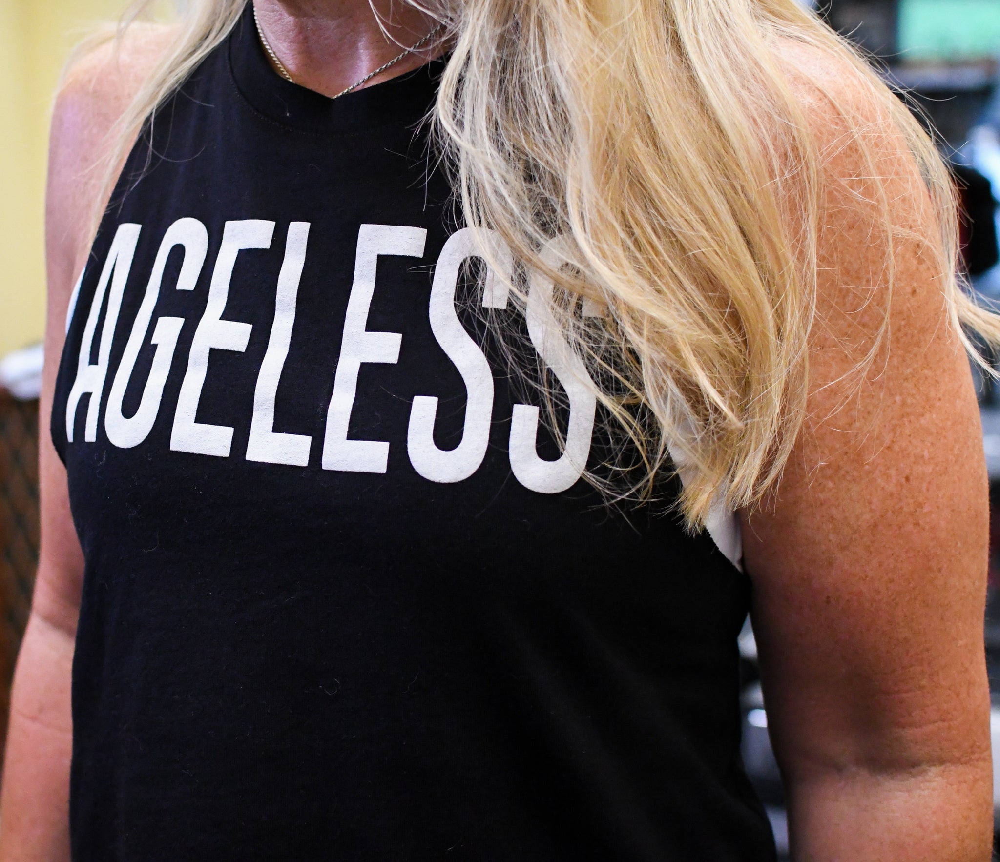 "Ageless" Black Sleeveless Cropped Tee