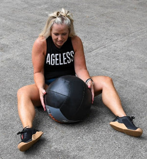 "Ageless" Black Sleeveless Cropped Tee